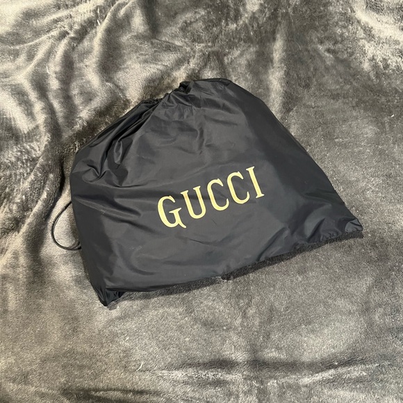 Gucci Black Leather Duffel Bag with Gold Accents